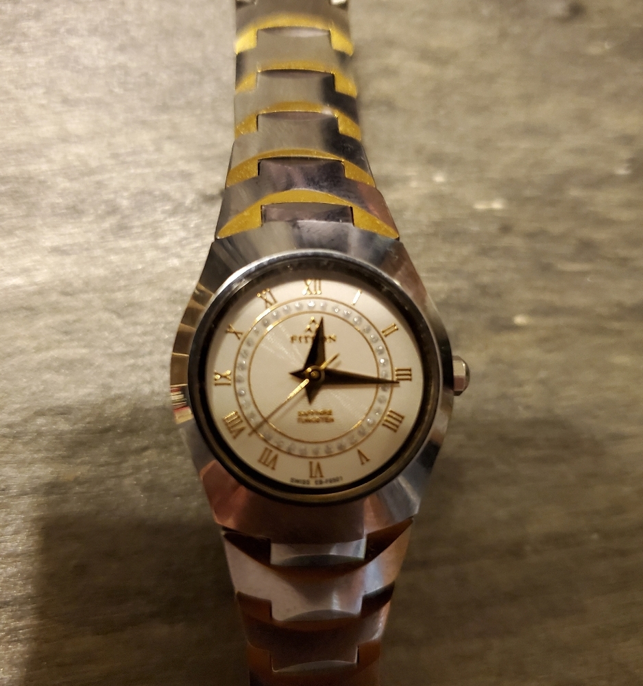 Fitron gold & silver spread open clasp watch